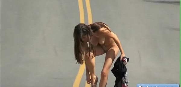  Sexy and naughty brunette teen girl amateur Nina reveal her pussy in the middle of the road